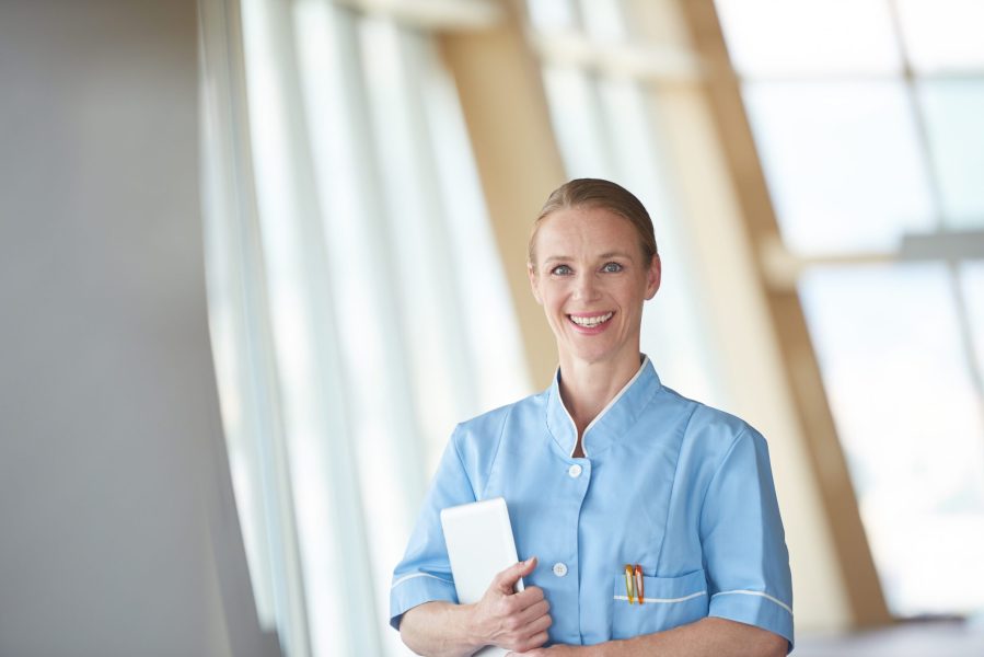 portrait of female doctor with  tablet computer at hospital